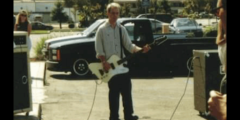 Brundage Screenshot Holding Bass